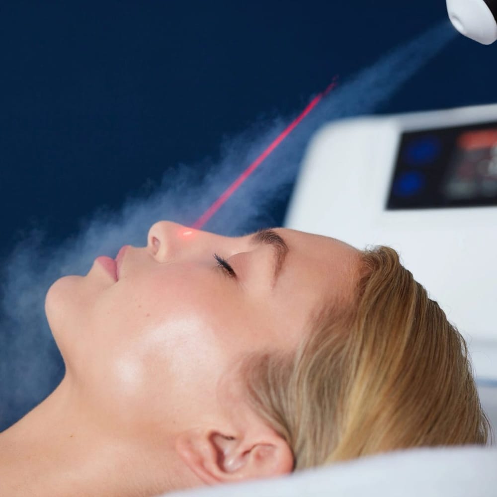 A cryofacial treatment being performed on a client